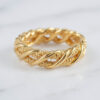 Luxury gold ring with Bahraini artisan filigree craftsmanship on white background