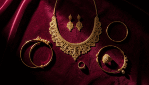 A complete gold bridal jewelry set including necklace, earrings and bangles arranged on velvet for a Bahrain wedding