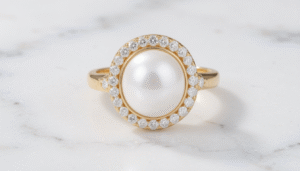Elegant pearl and diamond ring combination in a gold setting on a soft white background